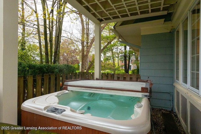 620 Ardson Rd, East Lansing, MI 48823 - wooden terrace with a hot tub and fence