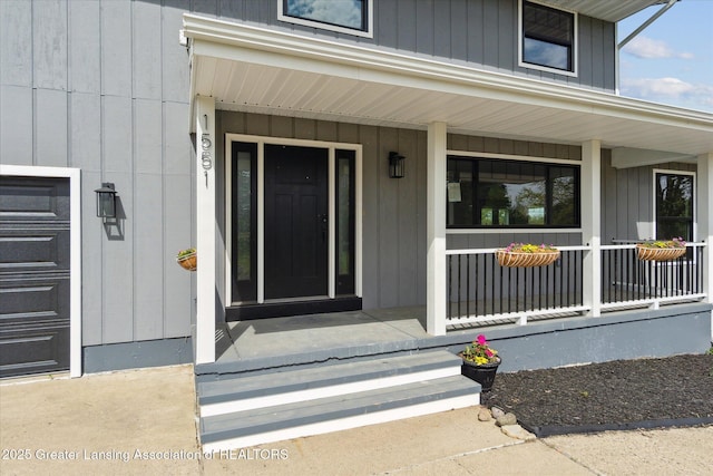 1551 E Lovejoy Rd, Perry, MI 48872 - doorway to property with a porch