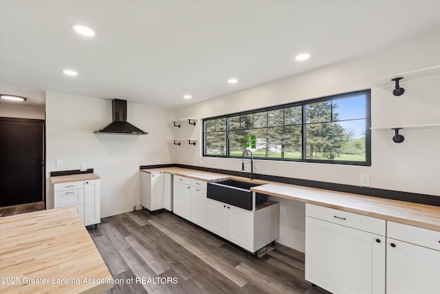 1551 E Lovejoy Rd, Perry, MI 48872 - kitchen featuring wooden counters, wall chimney range hood, a sink, open shelves, and recessed lighting