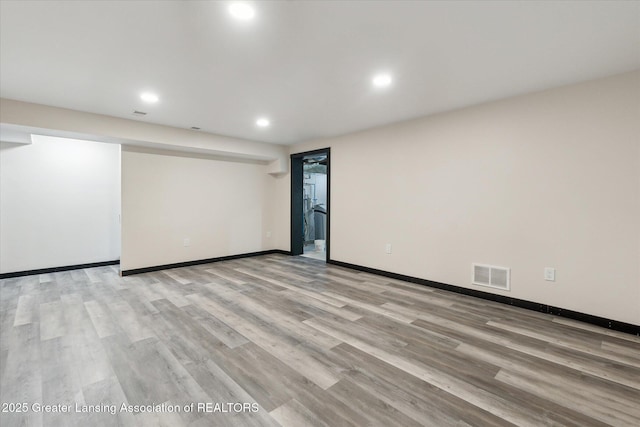 1551 E Lovejoy Rd, Perry, MI 48872 - finished basement featuring recessed lighting, light wood-style floors, and baseboards