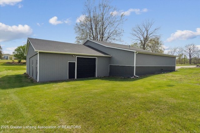 1551 E Lovejoy Rd, Perry, MI 48872 - back of property featuring a lawn and an attached garage