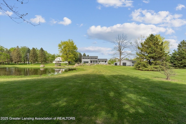1551 E Lovejoy Rd, Perry, MI 48872 - view of grassy yard featuring a water view