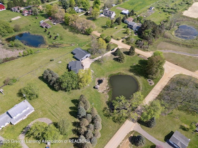 1551 E Lovejoy Rd, Perry, MI 48872 - aerial overview of property's location featuring a nearby body of water