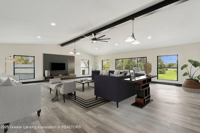 1551 E Lovejoy Rd, Perry, MI 48872 - living room with light wood-style flooring, a ceiling fan, baseboards, and recessed lighting