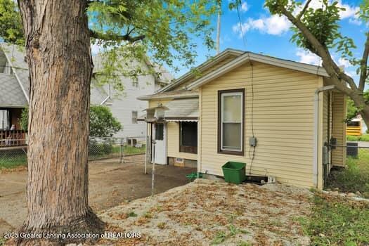 1600 S Pennsylvania Ave, Lansing, MI 48910 - view of rear view of house