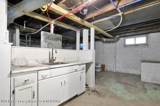 1600 S Pennsylvania Ave, Lansing, MI 48910 - below grade area with a sink