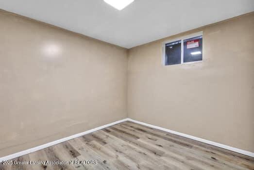 1600 S Pennsylvania Ave, Lansing, MI 48910 - finished basement with wood finished floors and baseboards