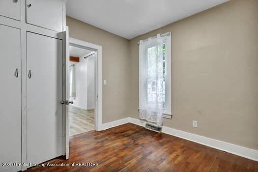 1600 S Pennsylvania Ave, Lansing, MI 48910 - entryway with baseboards and dark wood finished floors