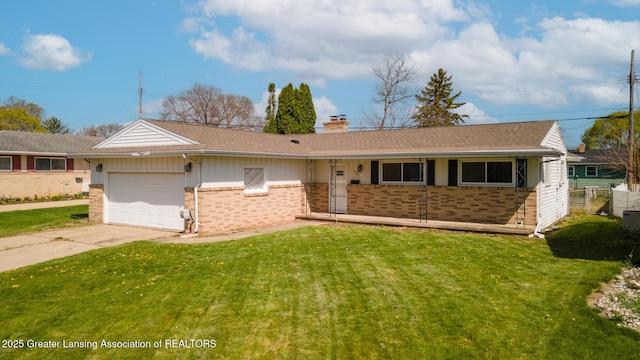 ranch-style house featuring brick siding, a garage, a front yard, a chimney, and driveway