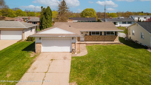 single story home with brick siding, a residential view, a front yard, and concrete driveway