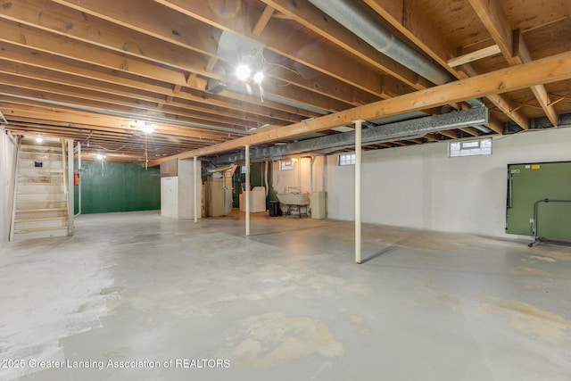 below grade area with a sink and stairway