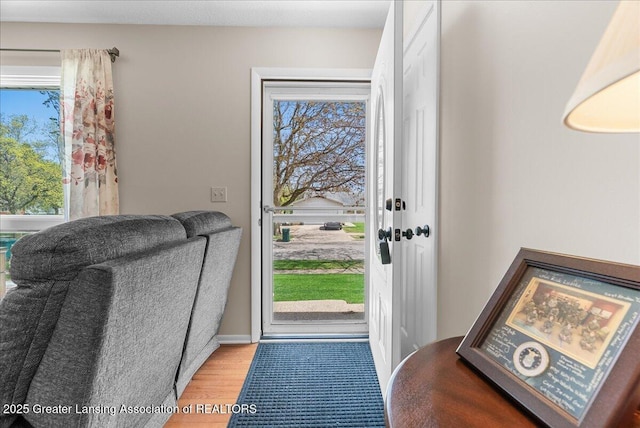 doorway featuring light wood-style flooring