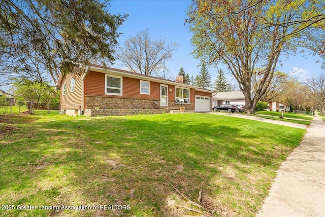 ranch-style house with driveway, a chimney, a front yard, and a garage