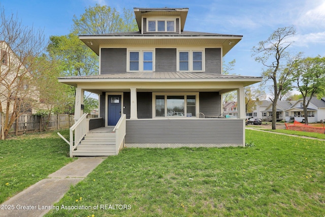 1127 W Saginaw St, Lansing, MI 48915 - traditional style home with fence, covered porch, and a front yard
