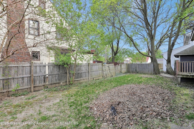 1127 W Saginaw St, Lansing, MI 48915 - view of yard featuring a fenced backyard