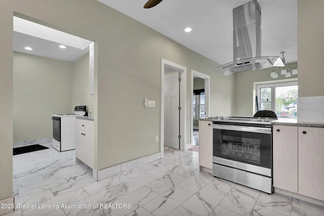 1127 W Saginaw St, Lansing, MI 48915 - kitchen with island range hood, baseboards, electric stove, marble finish floor, and white electric range oven