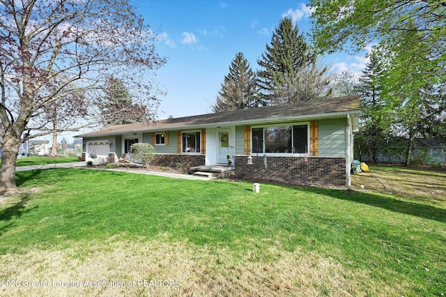 single story home featuring a garage, driveway, and a front lawn