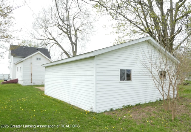 255 S Main St, Woodland, MI 48897 - view of home's exterior with a lawn