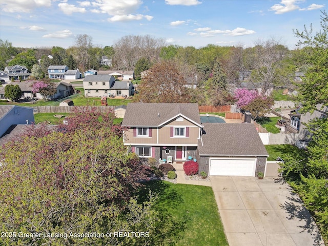 drone / aerial view with a residential view