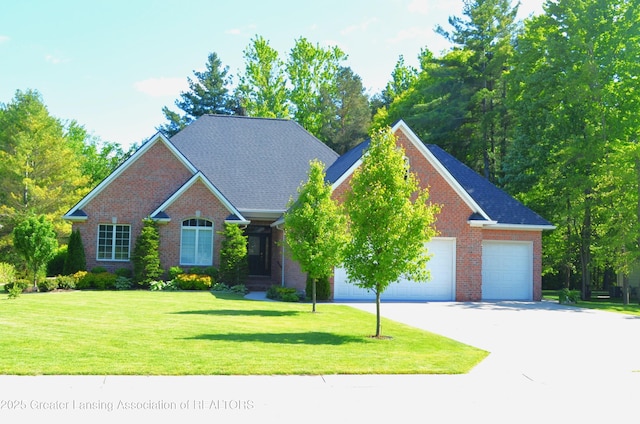 3401 N Burwick Dr, Port Huron, MI 48060 - view of front of home featuring a garage, driveway, brick siding, and a front lawn