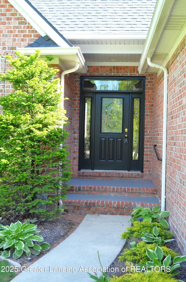 3401 N Burwick Dr, Port Huron, MI 48060 - property entrance with brick siding and roof with shingles