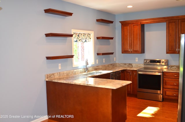3401 N Burwick Dr, Port Huron, MI 48060 - kitchen with stainless steel range with electric cooktop, open shelves, a sink, wood finished floors, and recessed lighting