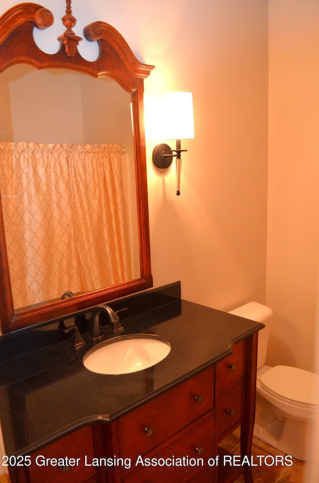 3401 N Burwick Dr, Port Huron, MI 48060 - bathroom featuring vanity and toilet