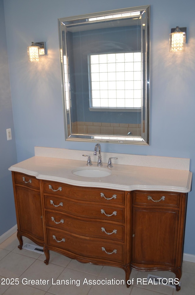3401 N Burwick Dr, Port Huron, MI 48060 - bathroom with vanity, tile patterned flooring, and baseboards