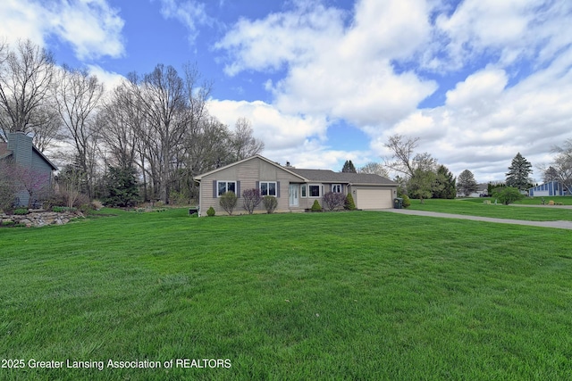 9408 W Scenic Lake Dr, Laingsburg, MI 48848 - ranch-style home with an attached garage, driveway, and a front yard