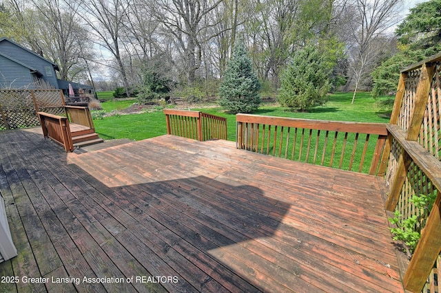 9408 W Scenic Lake Dr, Laingsburg, MI 48848 - wooden terrace with a lawn