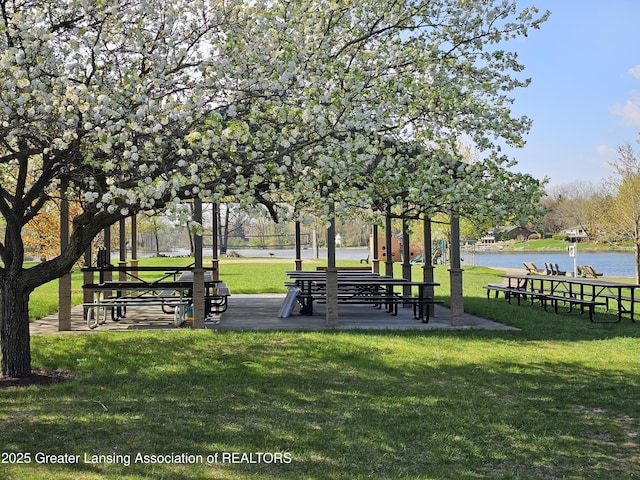 9408 W Scenic Lake Dr, Laingsburg, MI 48848 - view of home's community featuring a lawn and a water view