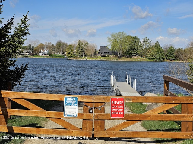 9408 W Scenic Lake Dr, Laingsburg, MI 48848 - view of dock with a water view
