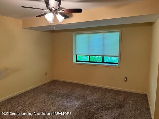 2434 Emerald Lake Dr, East Lansing, MI 48823 - carpeted empty room featuring baseboards and a ceiling fan