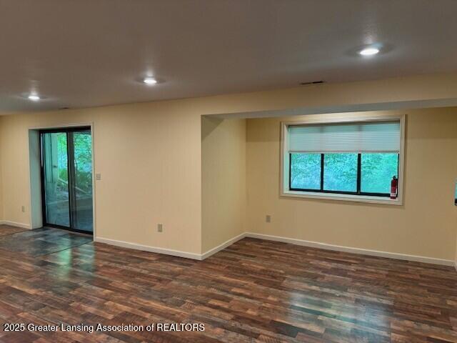 2434 Emerald Lake Dr, East Lansing, MI 48823 - spare room with dark wood-style floors and recessed lighting
