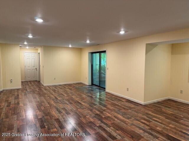 2434 Emerald Lake Dr, East Lansing, MI 48823 - unfurnished room with dark wood-type flooring and recessed lighting