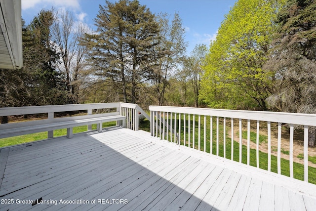 deck featuring a lawn