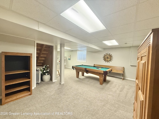recreation room with carpet floors, baseboards, radiator heating unit, a paneled ceiling, and billiards