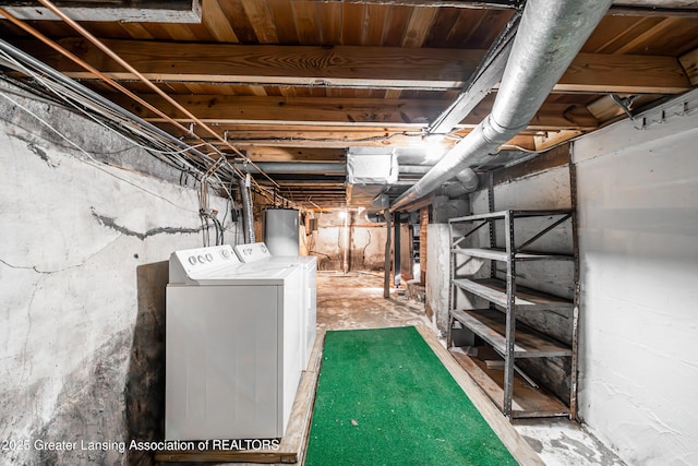 unfinished below grade area with independent washer and dryer and gas water heater