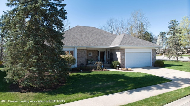 view of front of home featuring a garage, covered porch, a front yard, brick siding, and concrete driveway