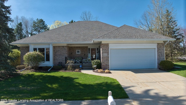 ranch-style house featuring a garage, covered porch, a front lawn, and brick siding