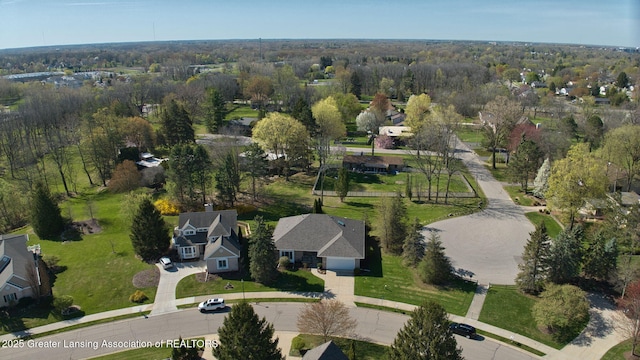 birds eye view of property with a residential view