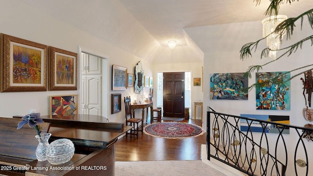 foyer entrance featuring wood finished floors