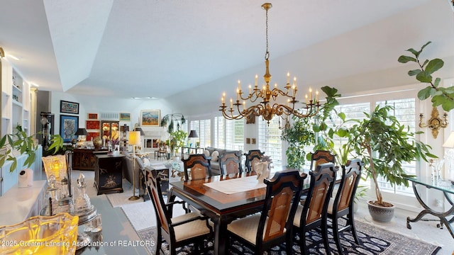 dining room featuring an inviting chandelier and plenty of natural light
