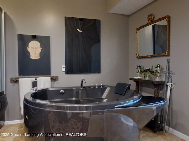 bathroom featuring baseboards