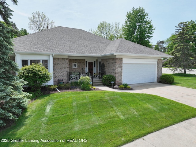 6074 E Longview Dr, East Lansing, MI 48823 - view of front facade featuring a porch, concrete driveway, a garage, a front lawn, and brick siding