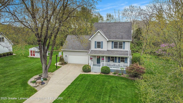 traditional-style house with covered porch, driveway, a front lawn, an attached garage, and a shingled roof