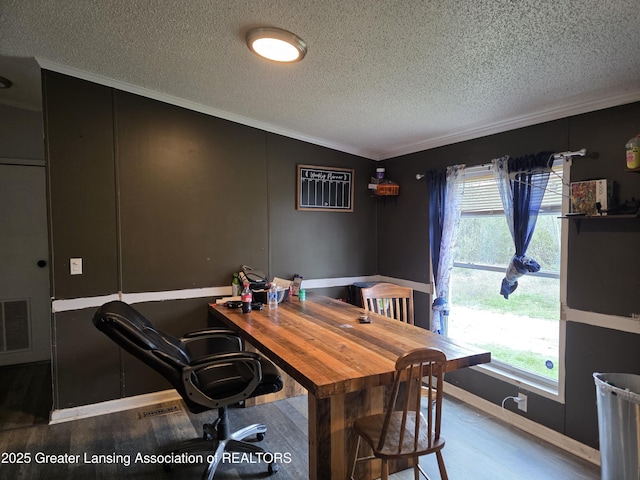 9304-9306 Parkhurst Hwy, Addison, MI 49220 - dining space featuring a textured ceiling, visible vents, ornamental molding, and a healthy amount of sunlight