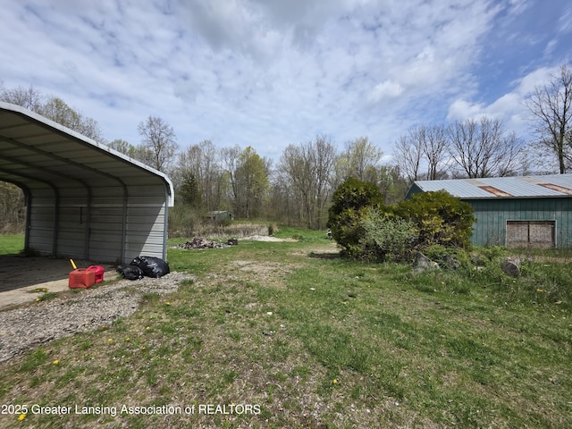 9304-9306 Parkhurst Hwy, Addison, MI 49220 - view of yard with a carport