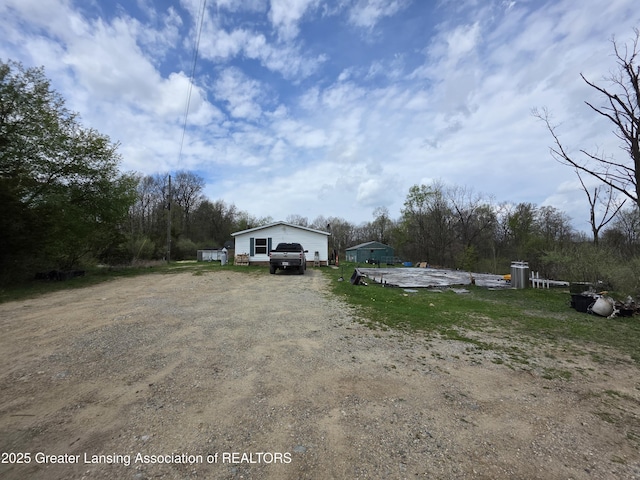 9304-9306 Parkhurst Hwy, Addison, MI 49220 - view of yard with driveway