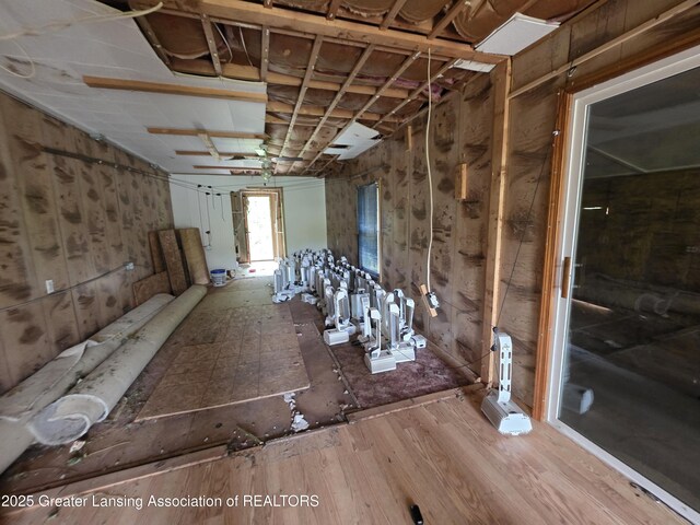 9304-9306 Parkhurst Hwy, Addison, MI 49220 - misc room featuring wood finished floors